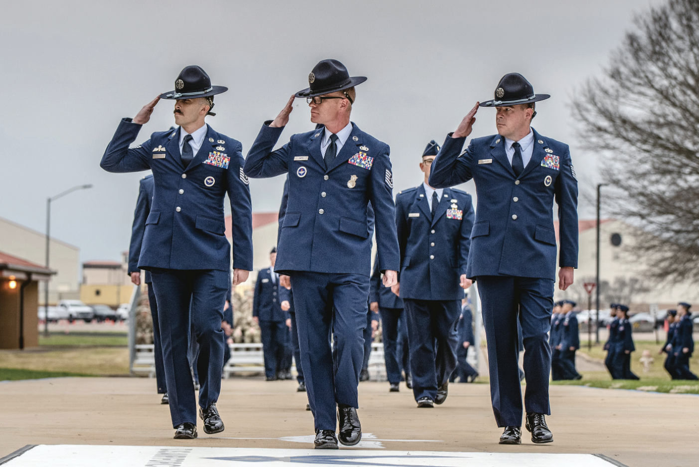 Air Force military training instructors lead formation of graduates at Air Force Officer Training School class 24-06 graduation parade, in Montgomery, Alabama, March 14, 2024 (U.S. Air Force/Brian Krause)